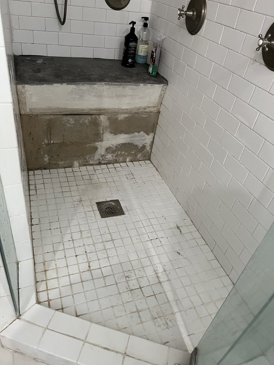 Before - Shower with bench, stained grout
